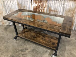 The Distressed Metal Inlay Worktable has a nice finish