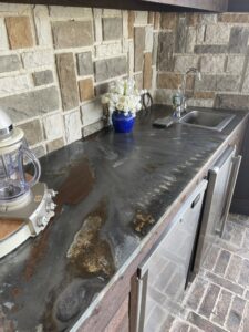 Worktable aligned with a sink designed by Hawthorne Tables