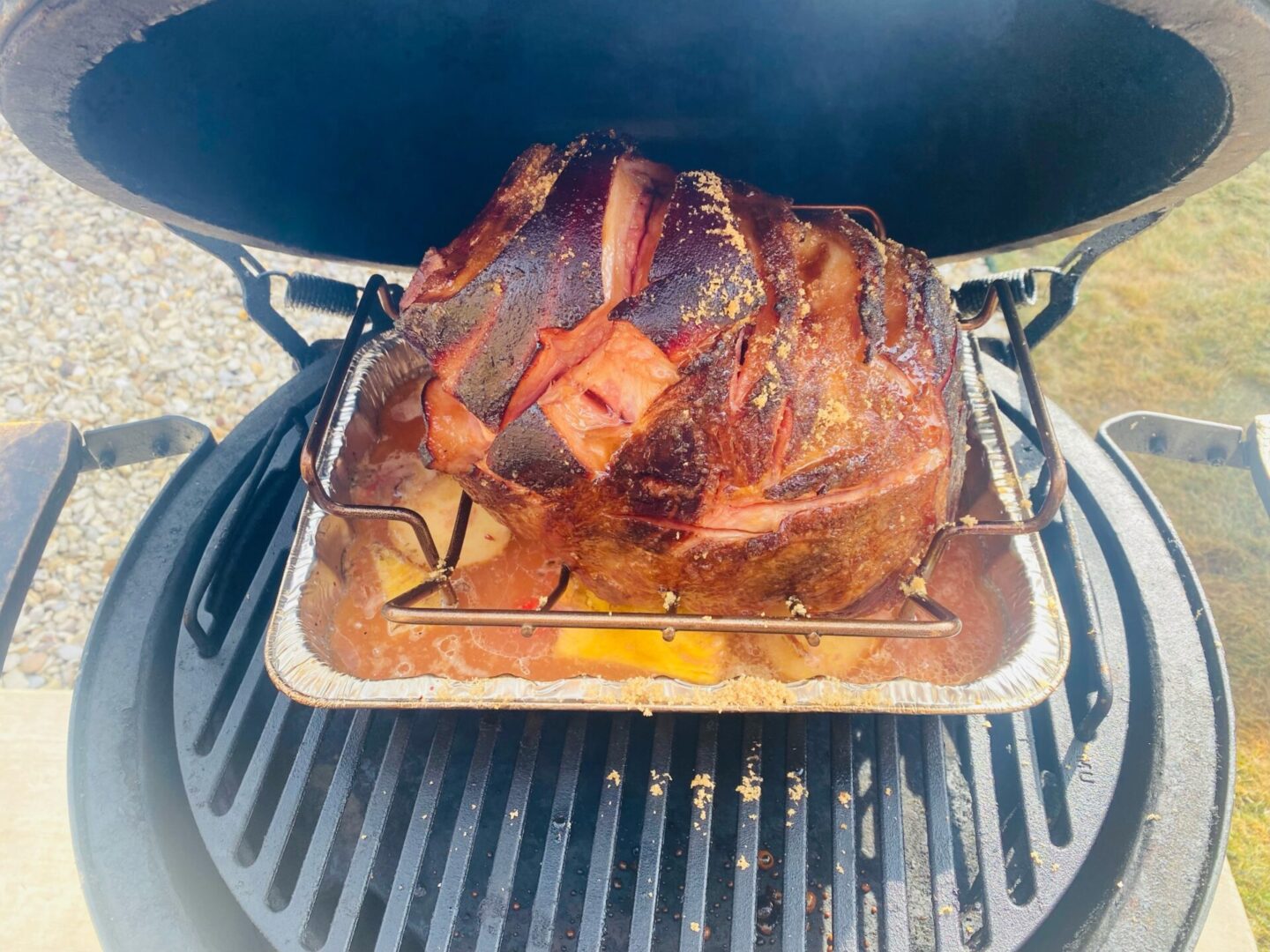 Ham in process of being grilled on one of the tables