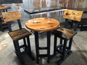 Bar Table with two chairs on display at the workshop