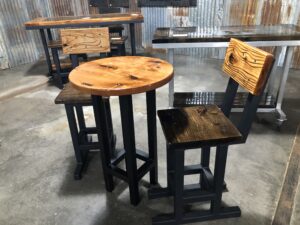 Angled view of the Bar Table with two chairs