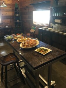 Food items placed on the worktable with stool alongside