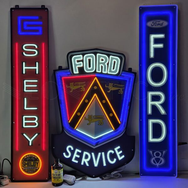 Neon Shelby and Ford service signs displayed.
